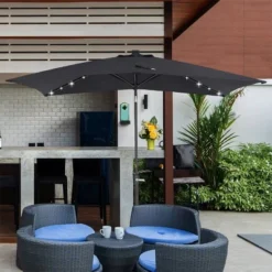 10' X 6.5' Solar LED Patio Umbrella With Tilt And Crank Lift Black - Wellfor 14 10' X 6.5' Solar LED Patio Umbrella With Tilt And Crank Lift Black - Wellfor -Garden Furniture Store GUEST 1913027b e865 477c 97c9 cde830b23b15