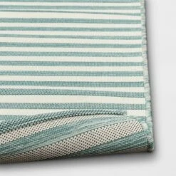 5'x7' Narrow Wornstripe Rectangular Woven Outdoor Area Rug Turquoise Blue - Threshold™ -Garden Furniture Store GUEST de24221f eb98 4b3d 8215 da45667ce98e