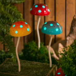 Evergreen 12.5"H Glow In The Dark Mushroom Plant Pick, Yellow Garden And Yard Decor